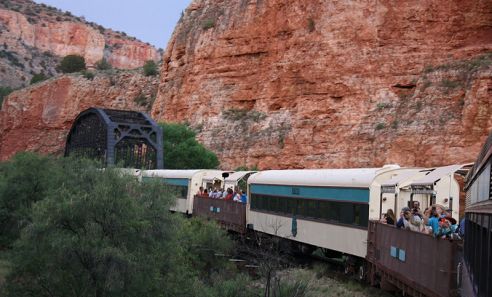 Located in the red rock country near Sedona, Verde Canyon Railroad’s rare ribbon of rails runs through a dramatic high desert landscape adjacent to a precious riparian ecosystem. Since 1912 this heritage railroad, sandwiched between two protected national